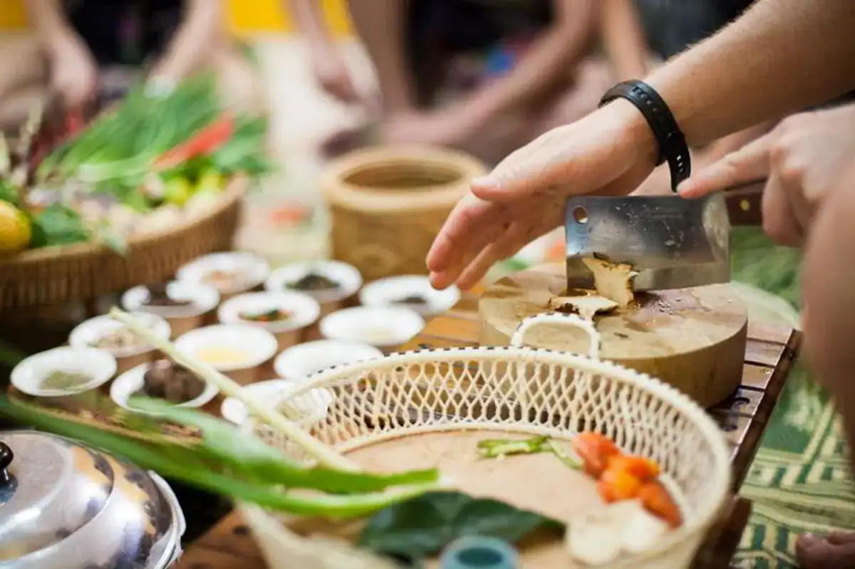 Preparing fresh Thai ingredients during a private cooking class in Phuket